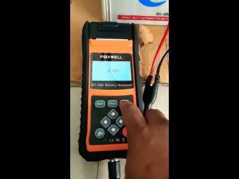 Foxwell BT780 Battery Tester being tested on a dead lead acid battery.